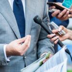 A public relations company executive doing public relations